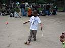 01_0043.JPG: Eeyore's Birthday 2004:  Ashton with diabolo