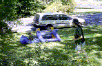 Dad watches James in the Slip-n-slide